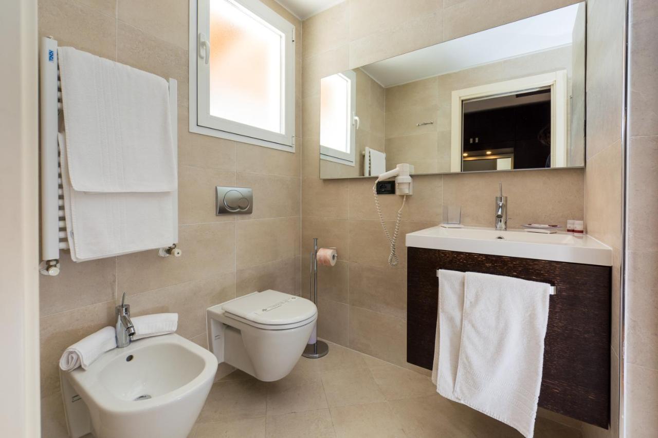 Hotel Smeraldo Lignano Sabbiadoro Bagian luar foto
